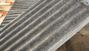 Roofing sheets that contain asbestos fibers