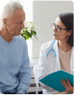 Mesothelioma doctor talking an older male patient
