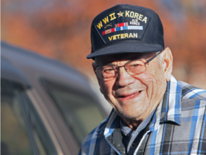 A World War II and Korean War veteran smiling